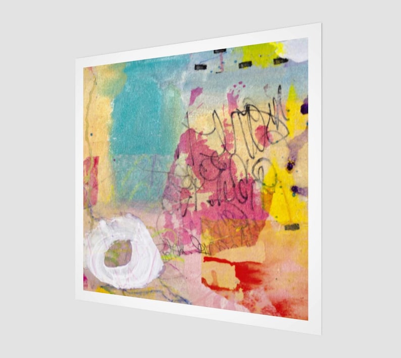 May include: Abstract art print with a white border. The artwork features a mix of colors, including blue, yellow, pink, and red. A white circle and black scribbles are also present. The piece has a textured appearance.