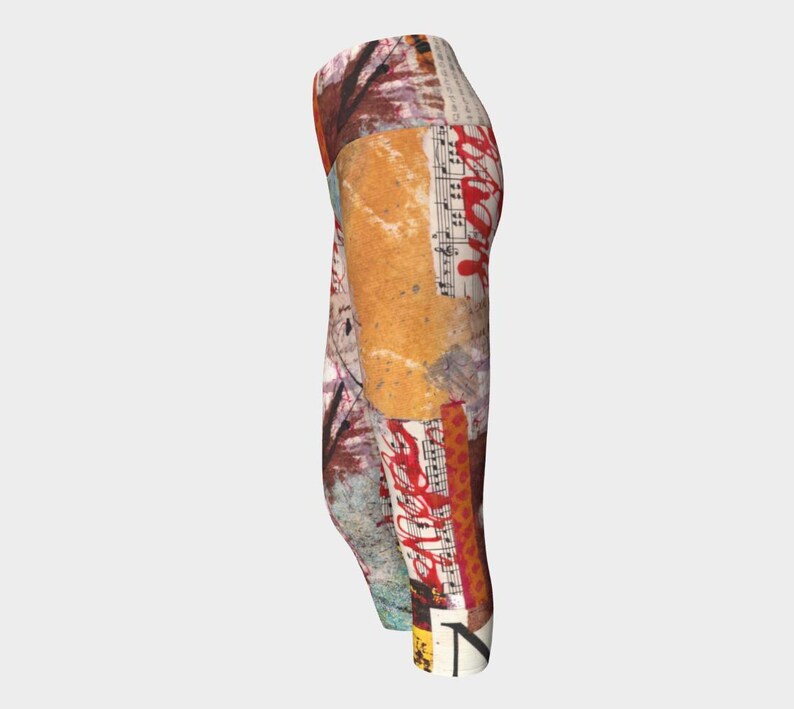 May include: Abstract patterned leggings featuring a collage of textures and colors. The design incorporates elements of sheet music, splattered paint, and various paper textures in shades of brown, red, and beige. The leggings are knee-length.