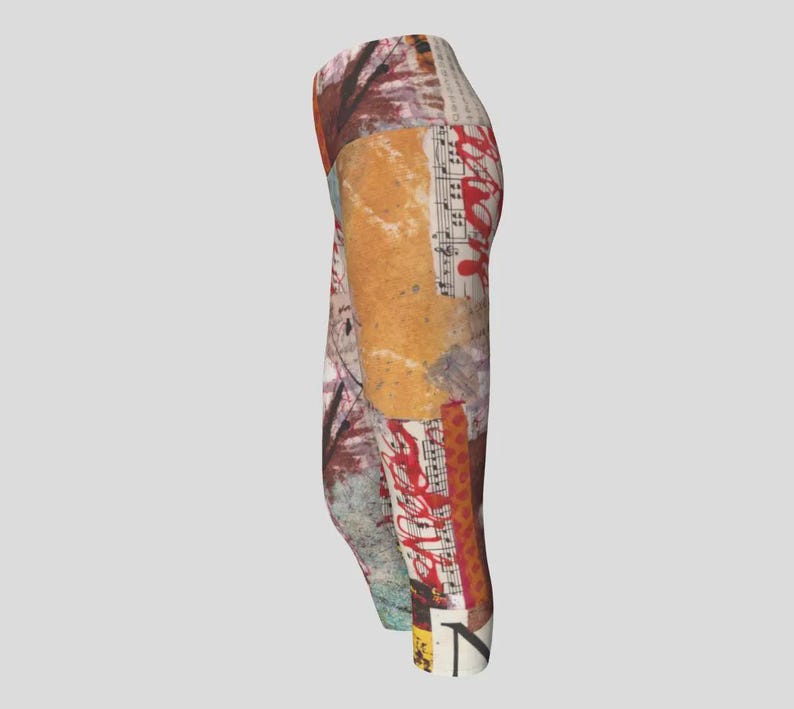 May include: A pair of leggings with a collage design. The leggings feature a mix of colors including brown, red, beige, and white. The design incorporates elements of sheet music and abstract patterns, creating a unique artistic look.