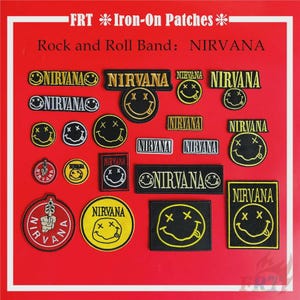 May include: A collection of iron-on patches featuring the band Nirvana. The patches include the band's name in various fonts and the iconic smiley face logo with crossed-out eyes. The patches are in black, yellow, and white.