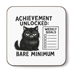 May include: Square white coaster with a black border. The coaster features a black cat wearing glasses, with the text "ACHIEVEMENT UNLOCKED: BARE MINIMUM" and a "WEEKLY GOALS" checklist.