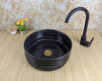Ręcznie robiona czarna ceramiczna umywalka nablatowa w stylu marokańskim