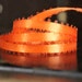 Orange Feather Edge Ribbon 3/16"
