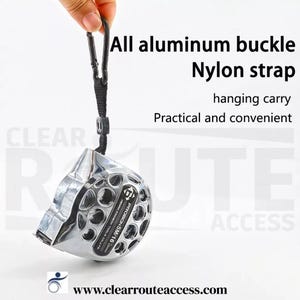 May include: A silver tape measure with an aluminum buckle and nylon strap. The text on the image reads "All aluminum buckle, Nylon strap, hanging carry, Practical and convenient." The tape measure is attached to a black carabiner.