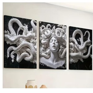 May include: A triptych of canvas art featuring a white sculpture of Medusa with snakes for hair, set against a black marble-like background. The artwork is displayed on a white wall, showcasing a classical theme.