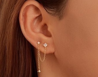 Pendiente de cadena doble con estrella de cristal: oro de 18 quilates y plata de ley