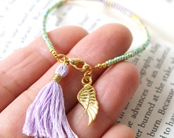 ON VACATION, Boho Thin Gold beaded bracelet Purple tassel bracelet Angel Wing Charm Boho friendship seed bead Tiny Minimal anklet
