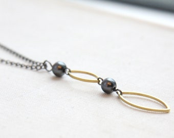 ON VACATION, Minimal Mixed Metal Geometric Necklace Solid Brass Charm Black Pearl Dainty Gunmetal Chain Industrial Steampunk