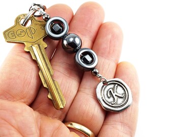 幾何学模様のヘマタイトキーホルダー、パーソナライズされたシルバー