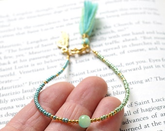 ON VACATION, Mint Green Gift Tassel Bracelet Thin Gold Angel Wing Charm Boho Friendship Bracelet Tiny Seed Bead Bracelet Minimal