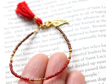ON VACATION, Brown and Red Tassel Bracelet Thin Gold Beaded Angel Wing Charm Boho Friendship Tiny Seed Bead Bracelet Minimal