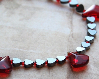 ON VACATION, Hematite Gemstone Heart Necklace Blood Red Glass Drops Oxblood Swarovski Crystals Black and Red Metallic Gray