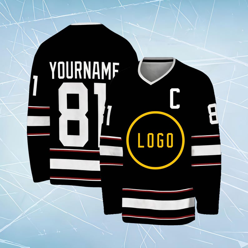 May include: A black hockey jersey featuring white and red stripes on the sleeves and hem. The front displays a yellow circular logo and the letter C, while the back shows the text YOURNAME above the large white number 81 and the number 1.