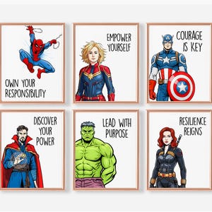 May include: Six framed superhero art prints. Each print features a different character: Spider-Man, Captain Marvel, Captain America, Doctor Strange, Hulk, and Black Widow. Each print has a motivational phrase.