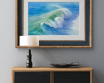 May include: A framed artwork depicting a breaking ocean wave. The wave is rendered in shades of blue and green, with white foam. The frame is dark blue with a gold inner edge. The artwork hangs above a wooden cabinet with black doors.