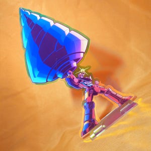 May include: A clear acrylic standee featuring a stylized robot character in shades of pink and blue, holding a large, oversized blue drill bit above its head. The figure is mounted on a transparent rectangular base, showcasing a vibrant graphic design.