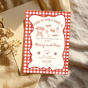 May include: A rectangular baby shower invitation card featuring a red and white gingham border and a central white area with red text and illustrations of a grill, hot dog, burger, and baby bottle. The text reads JOIN US FOR A BABY-Q, Penny and Max.