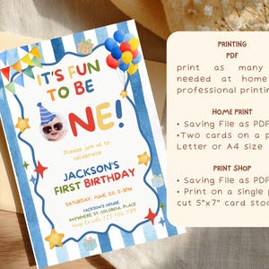 May include: A colorful birthday invitation with the text "IT'S FUN TO BE ONE!" and "JACKSON'S FIRST BIRTHDAY." The design includes balloons, stars, and a photo of a baby wearing sunglasses. The invitation is 5x7 inches.