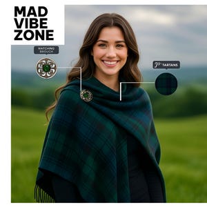 May include: A woman wearing a green and black plaid shawl with a matching brooch. The shawl is draped over the shoulders and has a fringed edge. The image includes the text "MAD VIBE ZONE" and "50 Tartans".