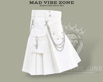 May include: A white utility kilt with a pleated design. It features a pocket with a decorative chain and a silver-tone chain detail. The kilt has the text "MAD VIBE ZONE" and "Modern Utility Kilt For Men".