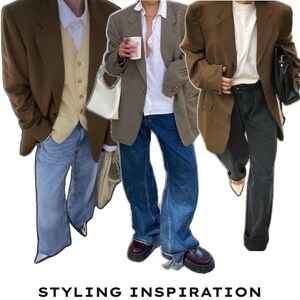 May include: Three outfits featuring oversized blazers in brown and grey tones paired with white shirts, a beige vest, blue denim jeans, and dark grey trousers. The image includes the text STYLING INSPIRATION at the bottom, showcasing layered clothing.
