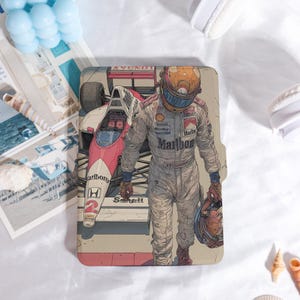 May include: A rectangular case with a Formula 1 race car and a driver in a racing suit. The car is red and white with the Marlboro logo. The driver is wearing a helmet and holding another helmet. The case has a vintage, illustrated style.
