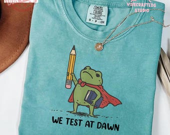 We Test At Dawn Funny Teacher Frog Comfort Colors Shirt, Test Day Teacher Shirt, Teacher Humor Shirt, Exam Day Outfit