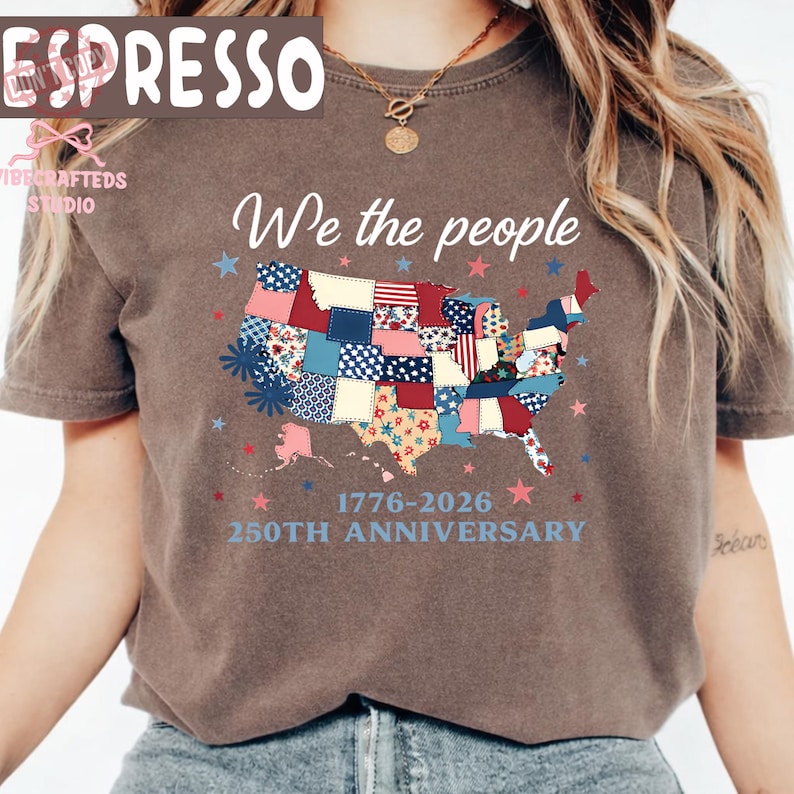 May include: A brown t-shirt with the words "We the people" above a patchwork map of the USA. The map is decorated with red, white, and blue stars and patches. The text "1776-2026 250th Anniversary" is below the map.