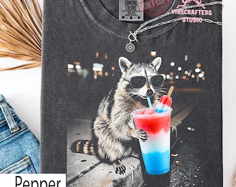 4th of July Raccoon Drinking Patriotic Slushie Comfort Colors Shirt, Funny American Meme Tee, Red White Blue Popsicle Drink Shirt