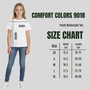 May include: A person wearing a white t-shirt and blue jeans. The shirt features a size chart with measurements in inches for Youth Midweight Tees. The text "COMFORT COLORS 9018" is at the top.
