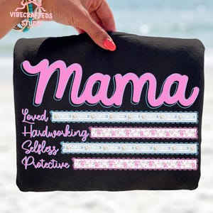 May include: A white ceramic mug with a black handle and the text "But First, Coffee" in a bold, black font. The mug is sitting on a wooden surface. The mug is approximately 4 inches tall.