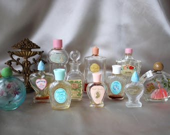 Samling av vintage parfymflaskor – Coty L'origan, Heaven Sent, Larkin