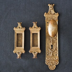 Ornate Antique Bronze Yale And Towne Door Knob Back Plate and 2 Pocket Door Recessed Pulls