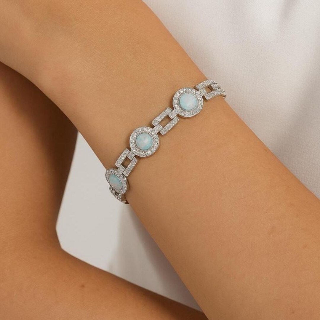 925スターリングシルバーホワイトギルソンオパールブレスレット。女性 