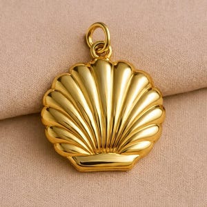 Förgyllt 925 sterlingsilver med snäckskal och medaljong