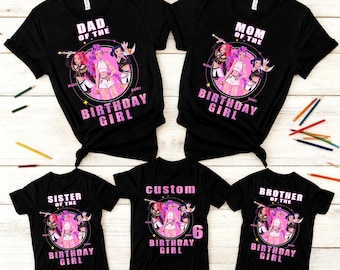 May include: Black t-shirts with pink text and graphics, featuring the words "DAD OF THE BIRTHDAY GIRL", "MOM OF THE BIRTHDAY GIRL", "SISTER OF THE BIRTHDAY GIRL", "BROTHER OF THE BIRTHDAY GIRL", and a custom shirt with the number 6. The shirts have a cartoon graphic.