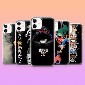 May include: A collection of phone cases with various designs. The cases feature colorful anime-style graphics, including characters and symbols. The cases are black with clear edges, and the designs are vibrant.
