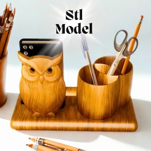 May include: Wooden desk organizer with an owl-shaped phone holder and two compartments for pens, pencils, and scissors. The organizer has a wood grain finish and the text "Stl Model" is visible.