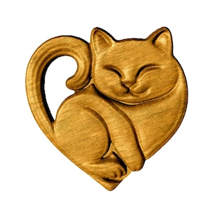 May include: A wooden carving of a cat curled up in a heart shape. The cat is painted a light brown colour and has a happy expression.