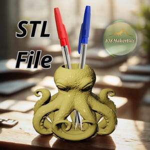 May include: A yellow octopus-shaped pen holder with two pens, one red and one blue. The pen holder has the text "STL File" on the left and a logo on the right. The octopus has detailed tentacles and a textured surface.