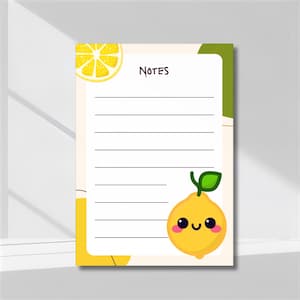 May include: A notepad with a lemon theme. The notepad has a cream background with a cartoon lemon slice at the top and a smiling lemon character at the bottom. The word "NOTES" is written at the top. Lined pages are visible.