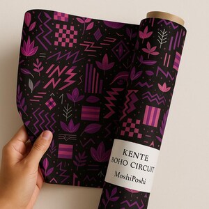 May include: A black and purple patterned wrapping paper roll with the text "Kente Boho Circuit MoshiPoshi" printed on a white label.