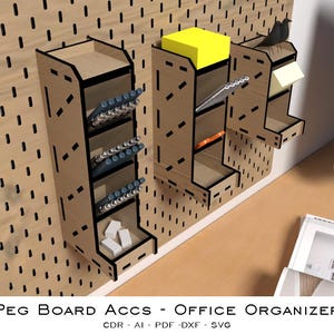May include: Wooden pegboard office organizer with multiple compartments for pens, sticky notes, and other office supplies. The organizer is mounted on a light brown pegboard. The text "PEG BOARD ACCS - OFFICE ORGANIZER" is visible.