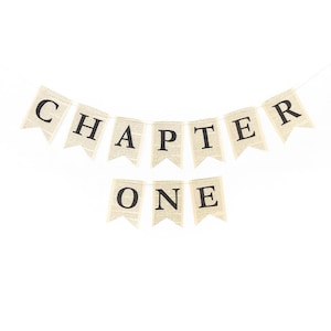 May include: A banner with the words "CHAPTER ONE" printed in black on individual flag-shaped pieces. The flags have a vintage look, with a background resembling aged book pages. The banner is strung on a thin white string against a white background.