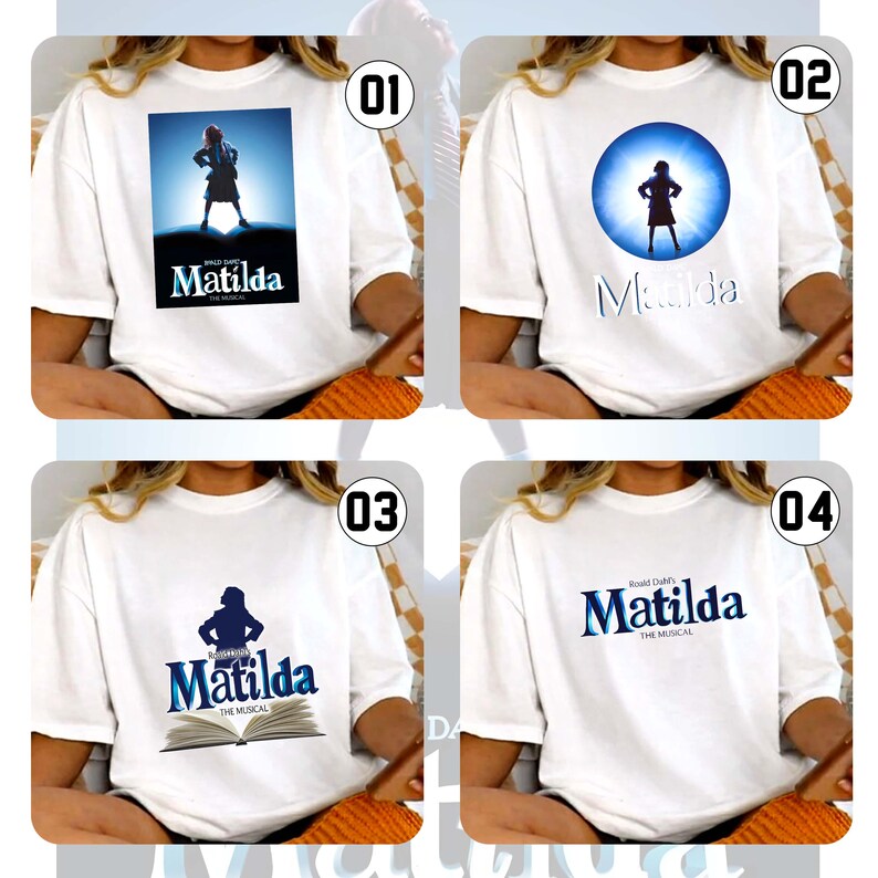 May include: Four white t-shirts with designs from the musical "Matilda." Each shirt has a different graphic: a silhouette of a girl, the musical's title, and the phrase "The Musical." The designs are in blue and white.