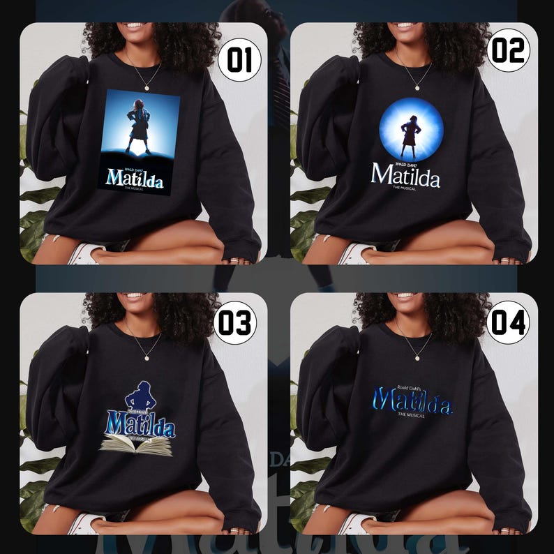 May include: Black sweatshirts with various designs related to the musical "Matilda." The designs include a silhouette of a girl, the musical's logo, and the title "Matilda" in different fonts. The sweatshirts are shown on a person.