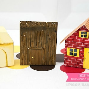 May include: Three paper house templates: a yellow straw house, a brown wood house, and a red brick house with a yellow door and windows. The houses are on a white surface with colorful polka dots. Text on the image reads "DIGITAL FILES".