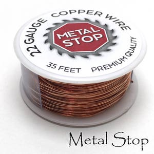 May include: A spool of 22 gauge copper wire, 35 feet long, labeled "Metal Stop Premium Quality Copper Wire".