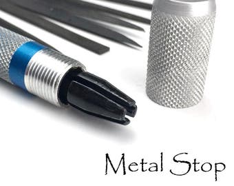 May include: Close-up of a metal tool with a textured silver handle and a blue band. The tool has a black, multi-pronged tip and is accompanied by several thin, dark metal rods. The text "Metal Stop" is visible.