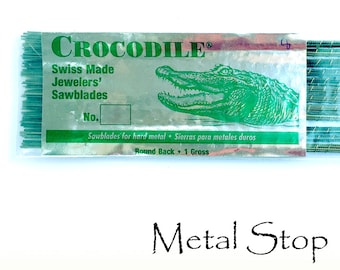 Jeweler&#39;s Saw Blades One Dozen Swiss made Crocodile rounded back performance blade size 0, 2/0, 1, 3/0, 4/0, and size 2. You choose size.